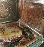 Greasey oven before cleaning
